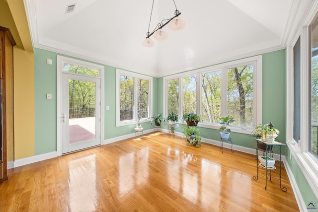 unfurnished sunroom featuring a wealth of natural light