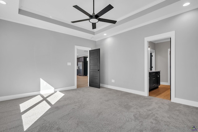 285 Lakeview Dr, Macon, GA 31211 - unfurnished bedroom featuring light colored carpet, crown molding, a raised ceiling, recessed lighting, and baseboards