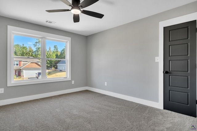 285 Lakeview Dr, Macon, GA 31211 - spare room featuring carpet flooring, a ceiling fan, and baseboards