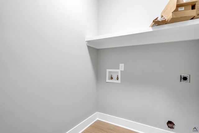 285 Lakeview Dr, Macon, GA 31211 - washroom with baseboards, washer hookup, electric dryer hookup, and light wood-style floors