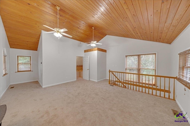 carpeted spare room with wood ceiling, lofted ceiling, and ceiling fan