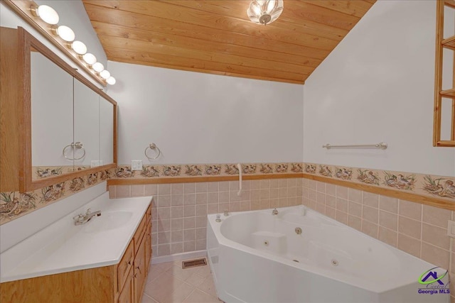 bathroom featuring lofted ceiling, vanity, a washtub, and wood ceiling