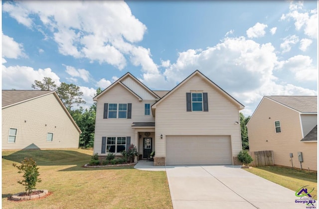 view of front of house featuring a front yard and a garage