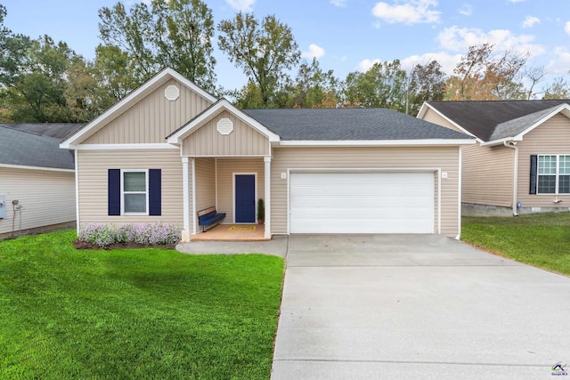 ranch-style home with a garage and a front yard