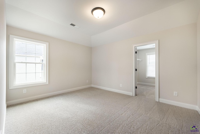 202 Bella Notte Cir, Warner Robins, GA 31088 - spare room featuring carpet, visible vents, and baseboards
