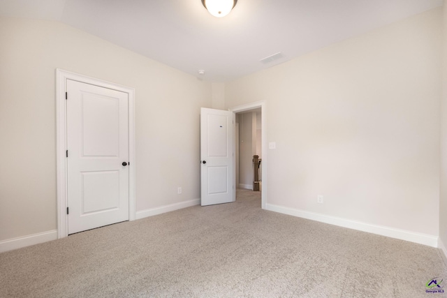 202 Bella Notte Cir, Warner Robins, GA 31088 - unfurnished room with baseboards, visible vents, and light colored carpet