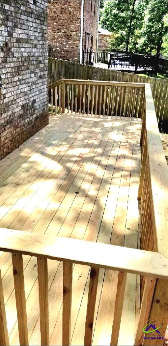 203 Lattice Bnd, Bonaire, GA 31005 - wooden deck with fence
