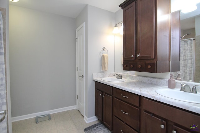 bathroom featuring vanity, walk in shower, and tile patterned floors