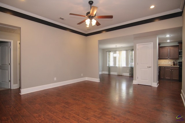 unfurnished living room with sink, crown molding, ceiling fan, and dark hardwood / wood-style flooring