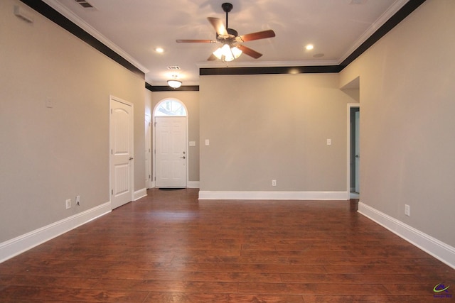 entrance foyer with ornamental molding, dark hardwood / wood-style floors, and ceiling fan