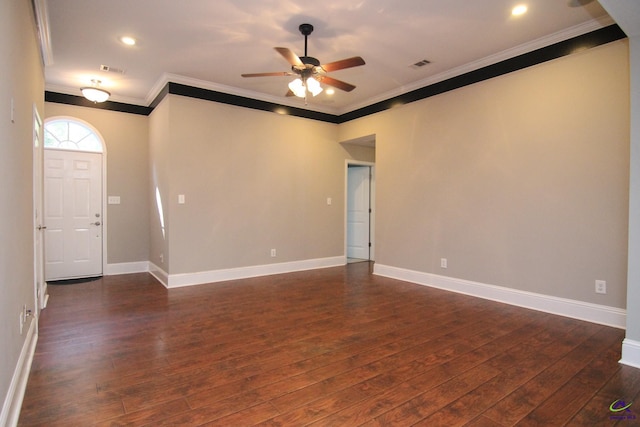 empty room with dark wood-type flooring, ceiling fan, and ornamental molding