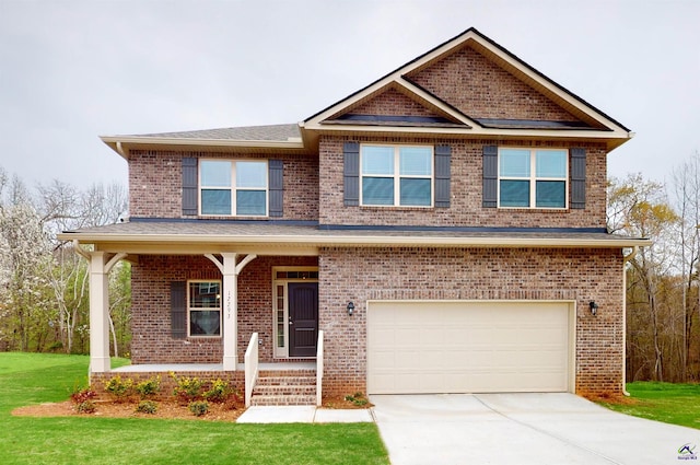 craftsman inspired home with a front lawn, a porch, and a garage