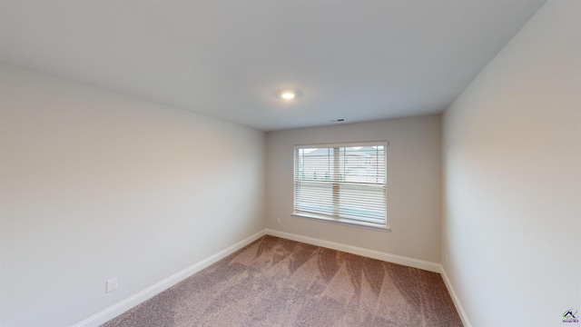 empty room with carpet floors