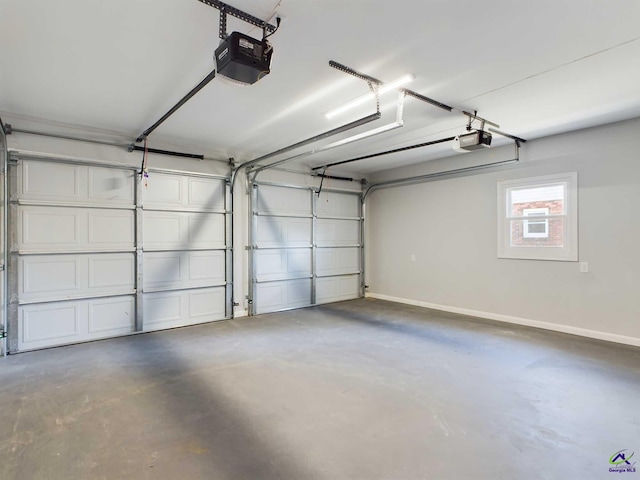 garage featuring a garage door opener