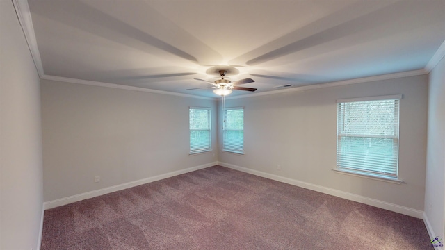 unfurnished room with a healthy amount of sunlight, carpet flooring, ornamental molding, and ceiling fan