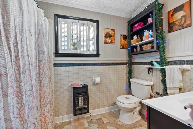 bathroom featuring tile walls, a textured ceiling, vanity, and toilet