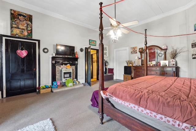 bedroom with carpet flooring, ornamental molding, and ceiling fan