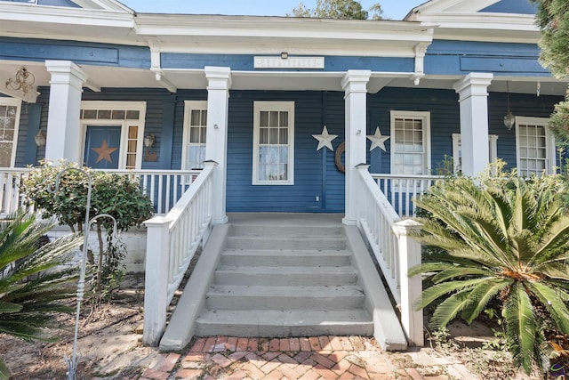 doorway to property with covered porch