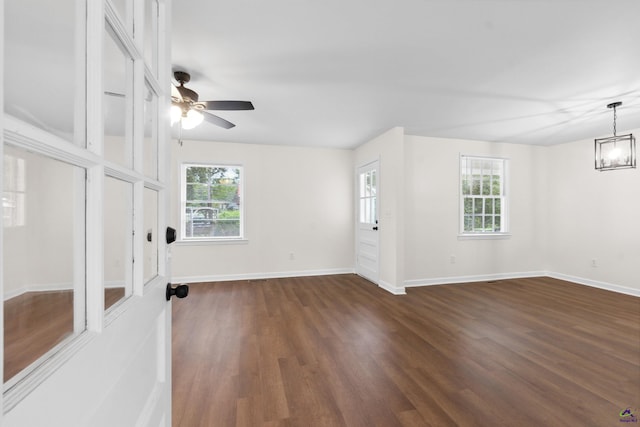 interior space featuring dark hardwood / wood-style floors and ceiling fan