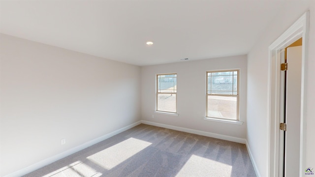 view of carpeted spare room