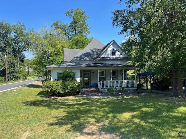 view of front of house featuring a front lawn and a porch