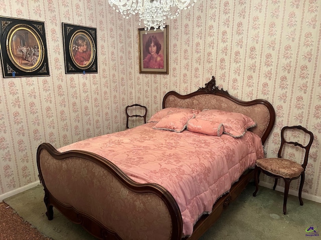 carpeted bedroom featuring a chandelier