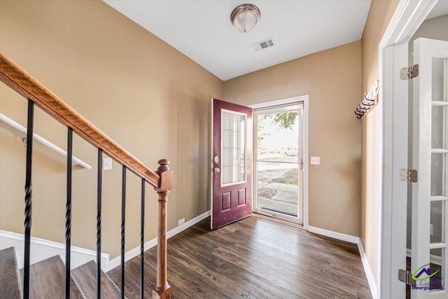 foyer with dark wood-type flooring