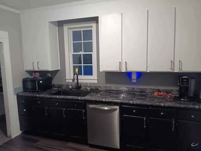 kitchen featuring stainless steel dishwasher, ornamental molding, dark wood-type flooring, sink, and white cabinetry