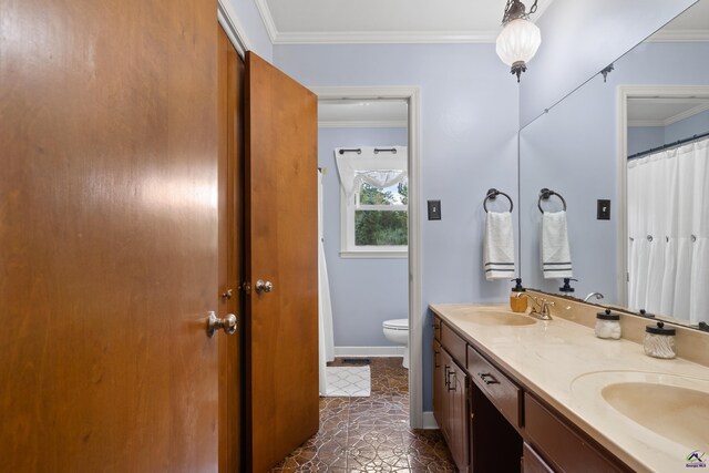 bathroom featuring ornamental molding, tile patterned flooring, vanity, and toilet