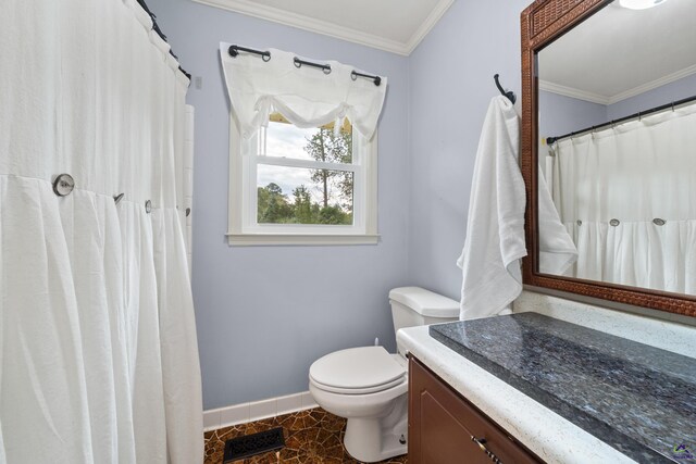 bathroom featuring vanity, crown molding, toilet, and tile patterned flooring