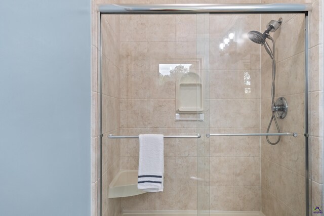 bathroom with an enclosed shower