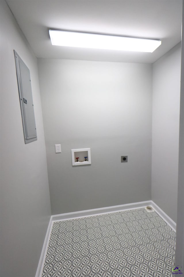 laundry room featuring electric panel, electric dryer hookup, washer hookup, and baseboards