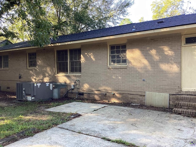 view of home's exterior with a patio