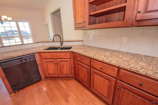 kitchen with light wood-type flooring, crown molding, sink, a notable chandelier, and black dishwasher