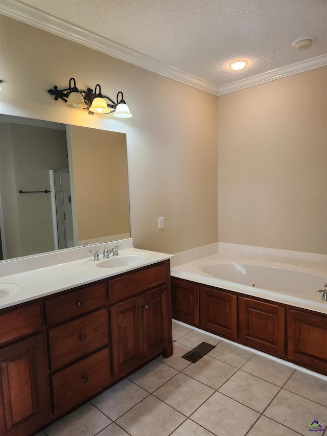 bathroom featuring tile patterned flooring, vanity, crown molding, and a textured ceiling