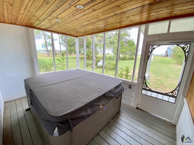 sunroom with wood ceiling