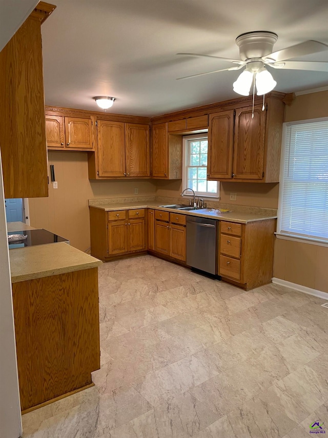 kitchen featuring ceiling fan, dishwasher, and sink