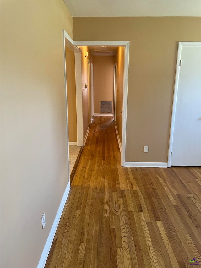 corridor featuring light hardwood / wood-style floors