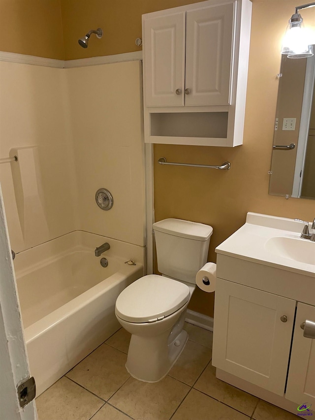 full bathroom featuring toilet, tile patterned flooring, vanity, and  shower combination