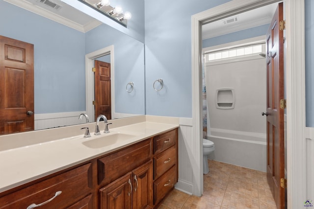 full bathroom featuring vanity, toilet, ornamental molding, shower / bath combo, and tile patterned flooring