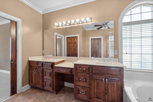 bathroom with ornamental molding, a tub, ceiling fan, and vanity