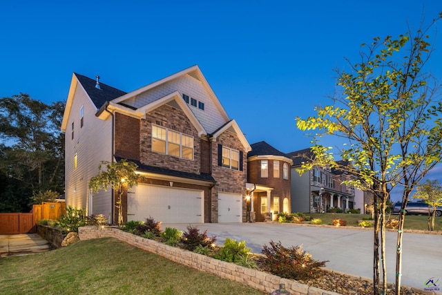 view of front facade with a front yard and a garage