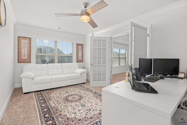 office featuring ceiling fan, light colored carpet, french doors, and ornamental molding