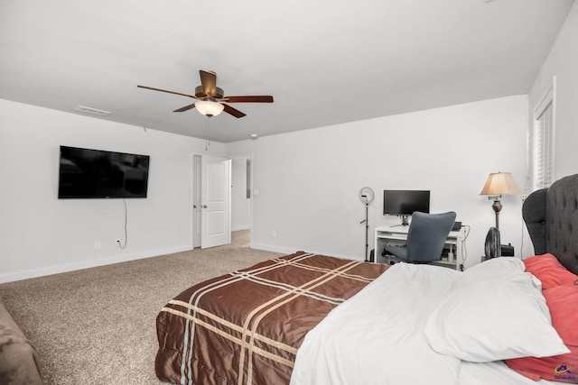 bedroom with ceiling fan and carpet floors