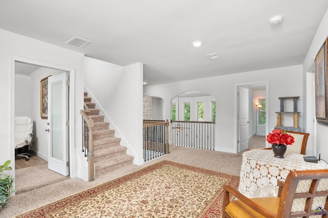 hallway featuring carpet flooring