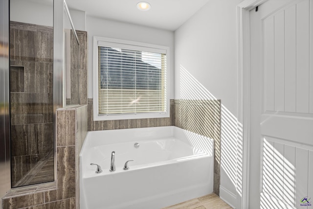 bathroom with plus walk in shower