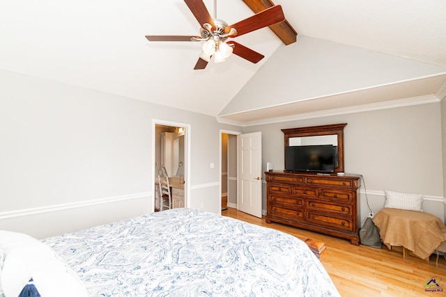 bedroom with ceiling fan, lofted ceiling with beams, ensuite bath, and wood-type flooring