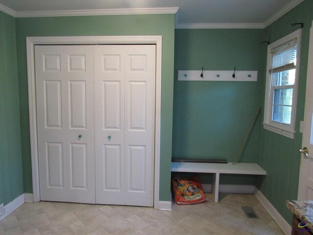 mudroom with crown molding