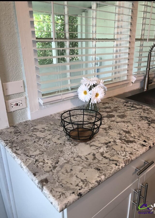 5415 Beulah Ave, Eastman, GA 31023 - kitchen view of light stone countertops and a sink