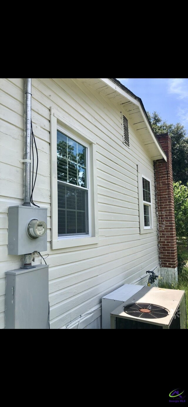 5415 Beulah Ave, Eastman, GA 31023 - view of side of property with central air condition unit